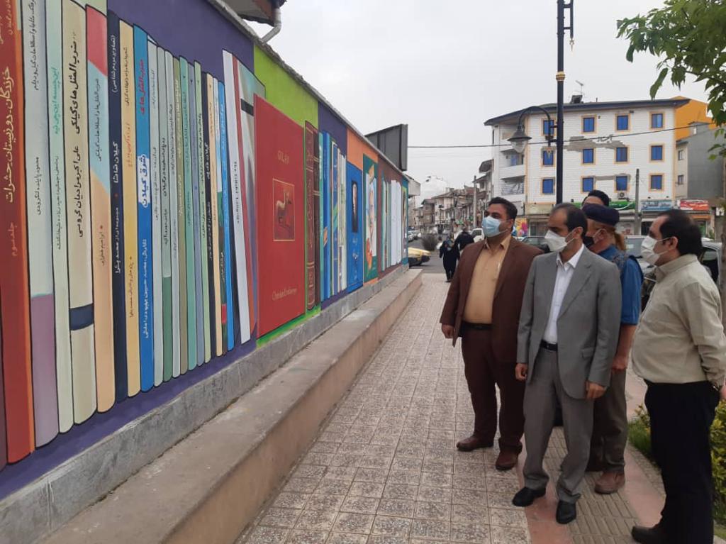 همزمان با روز سلامت اجرای دیوار نگاری مدافعان سلامت توسط سازمان سیما منظر و فضای سبز شهرداری رشت